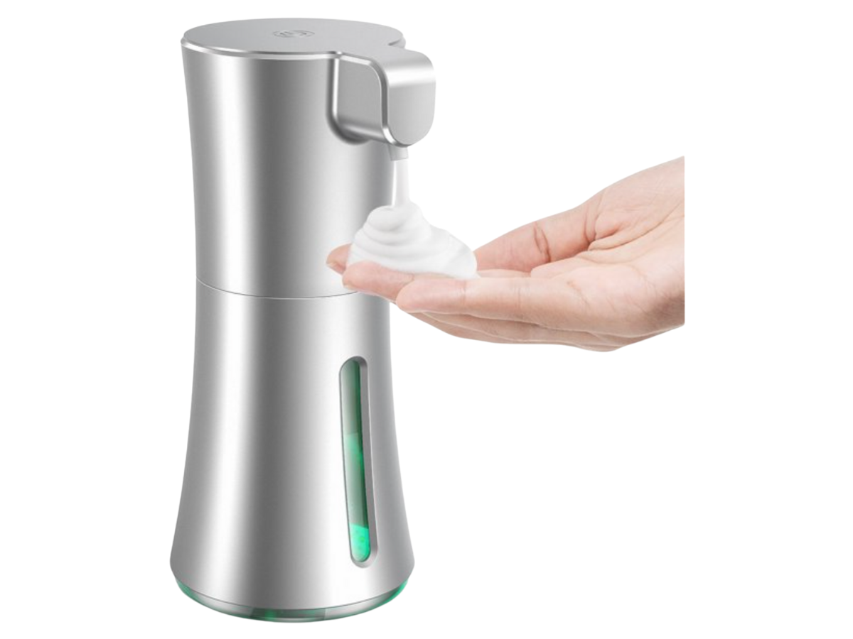 Silver hand soap dispenser with foaming soap in a hand.