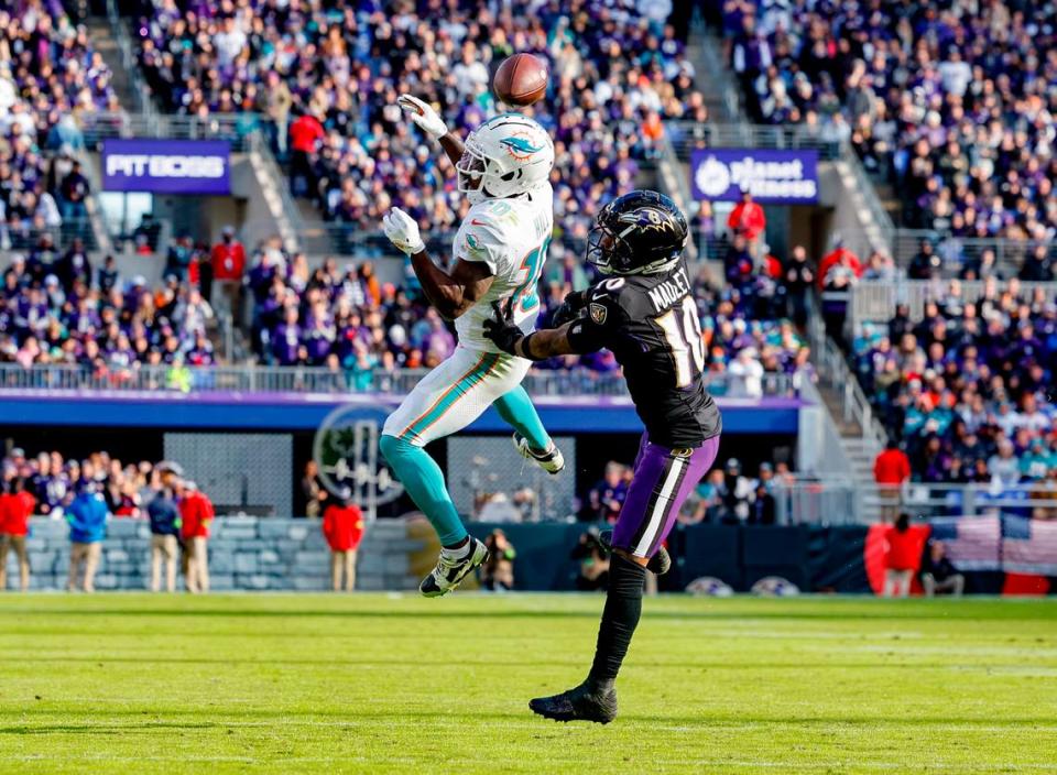 Miami Dolphins wide receiver Tyreek Hill (10) is unable to catch as Baltimore Ravens cornerback Arthur Maulet (10) defends during first half of an NFL football game at M&T Bank Stadium in Baltimore, Maryland on Sunday, December 31, 2023.
