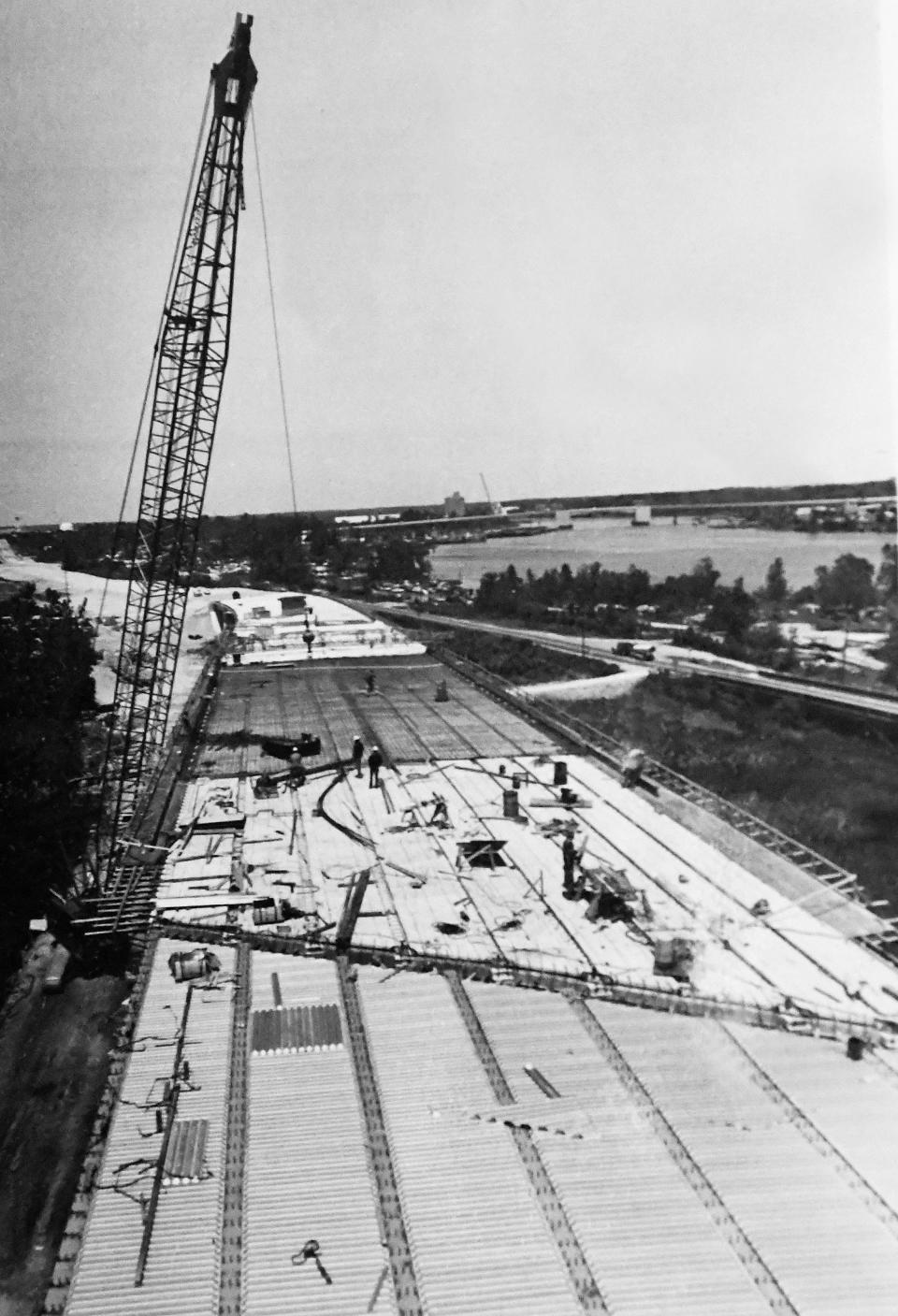 A view from a crane bucket show how work continues on what is now the S Thomas Rhodes Bridge along Hwy 421 in Wilmington, N.C. on May 16, 1984. [STARNEWS/JACK UPTON]
