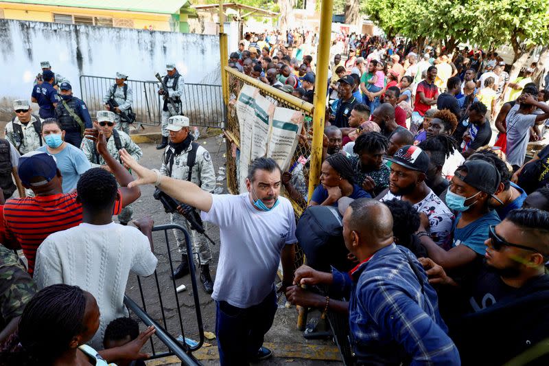 Migrants gather to regularize their migratory situation in COMAR, in Tapachula