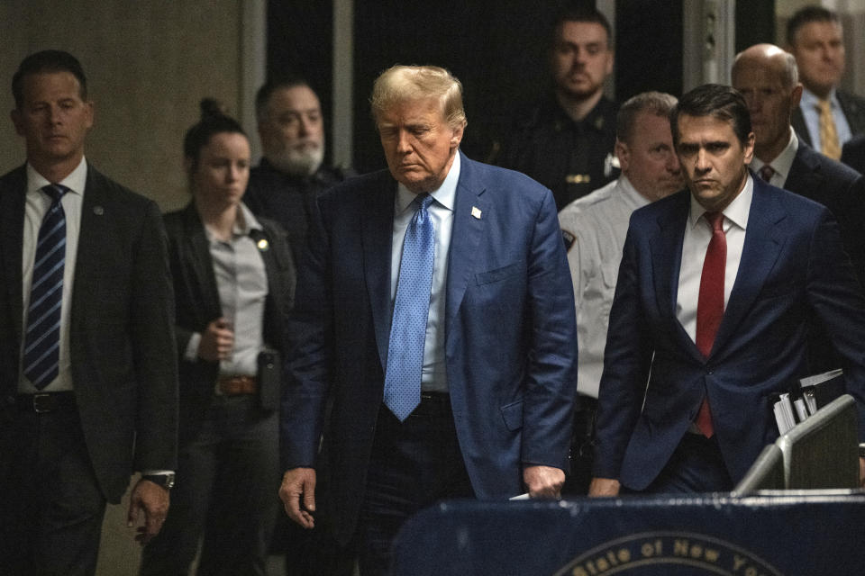 Former President Donald Trump, with his attorney Todd Blanch at his side, arrives for his trial at Manhattan Criminal Court, Thursday, May 9, 2024, in New York. (Victor J. Blue/The Washington Post via AP, Pool)