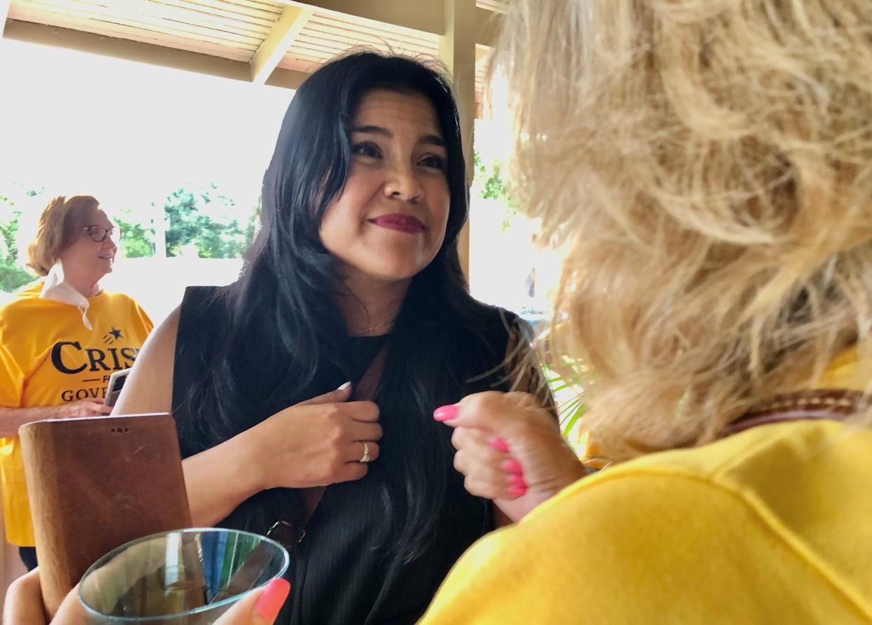 Karla Hernandez-Mats, running mate of Charlie Crist in the governor's race, meets with Volusia County Democrats at their DeLand headquarters Friday evening. Prior to her selection, she was president of the United Teachers of Dade and a former teacher.