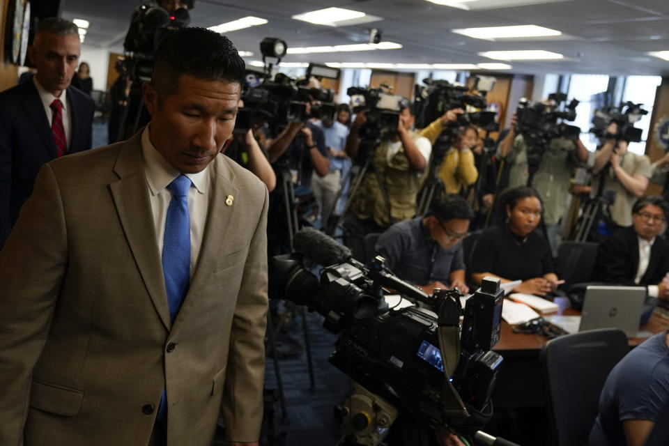 Eddy Wang, Homeland Security Investigations Special Agent in Charge, left, arrives for a news conference where U.S. Attorney Martin Estrada announced charges against Ippei Mizuhara, former longtime interpreter for Los Angeles Dodgers star Shohei Ohtani Thursday, April 11, 2024, in Los Angeles. (AP Photo/Ryan Sun)