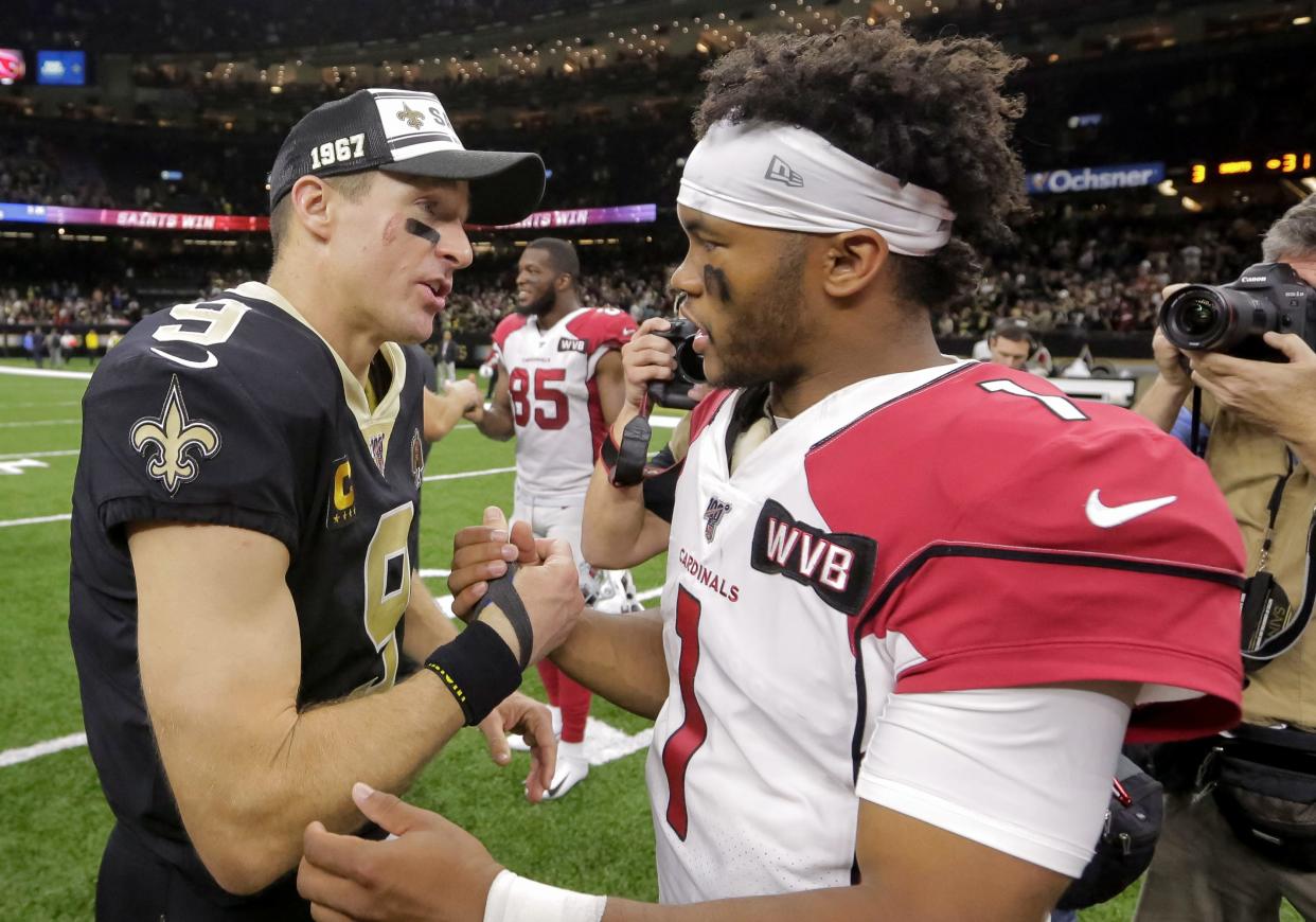 New Orleans Saints quarterback Drew Brees (9) talks with Arizona Cardinals quarterback Kyler Murray (1) after a win at the Mercedes-Benz Superdome.