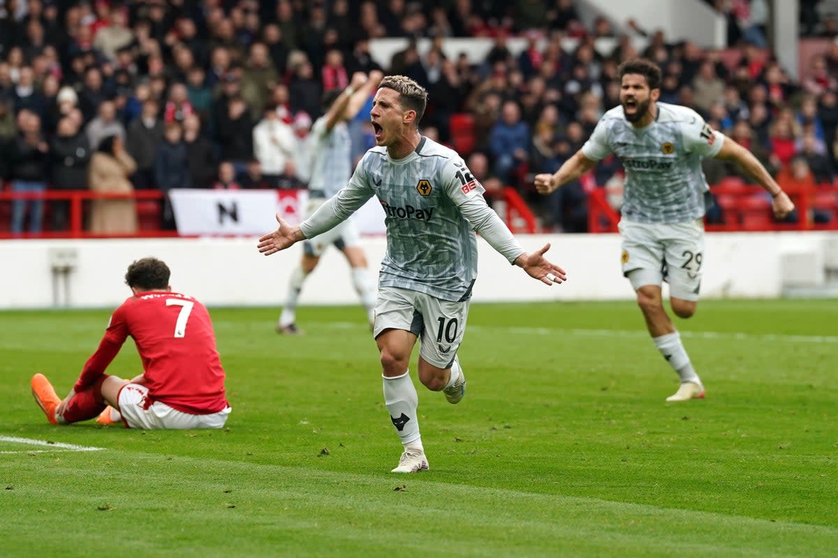 Daniel Podence (centre) celebrates his equaliser for Wolves (Nick Potts/PA). (PA Wire)