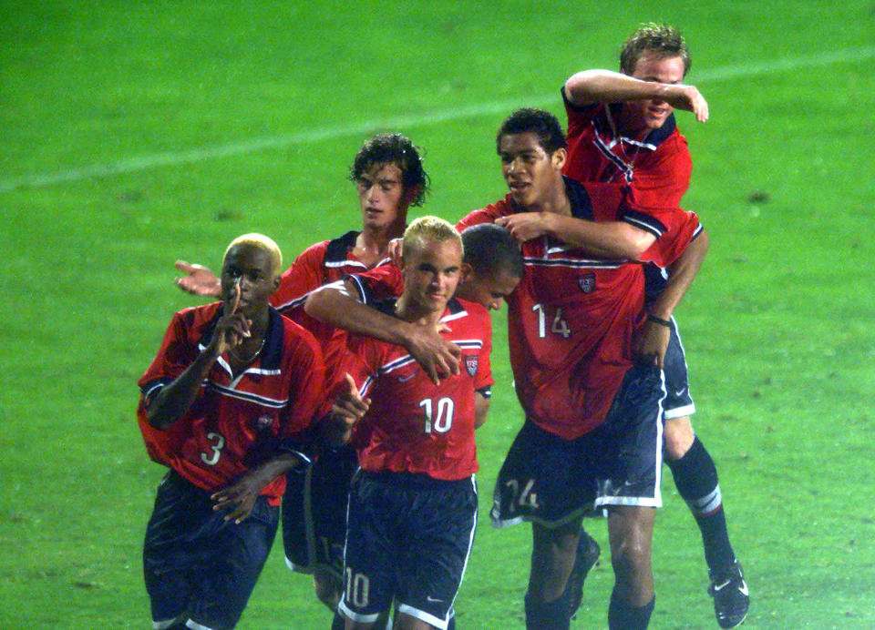 AUCKLAND, NEW ZEALAND - NOVEMBER 10:  USA's players including DaMarcus Beasley (3) Landon Donovan (10) and Oguchi Onyewu celebrate the goal of Landon Donovan during their opening game against New Zealand in the FIFA U17 World Soccer Champs played at the Nth Harbour Stadium on Wednesday.USA won the match 21.DIGITAL IMAGE.  (Photo by Phil Walter/Getty Images)