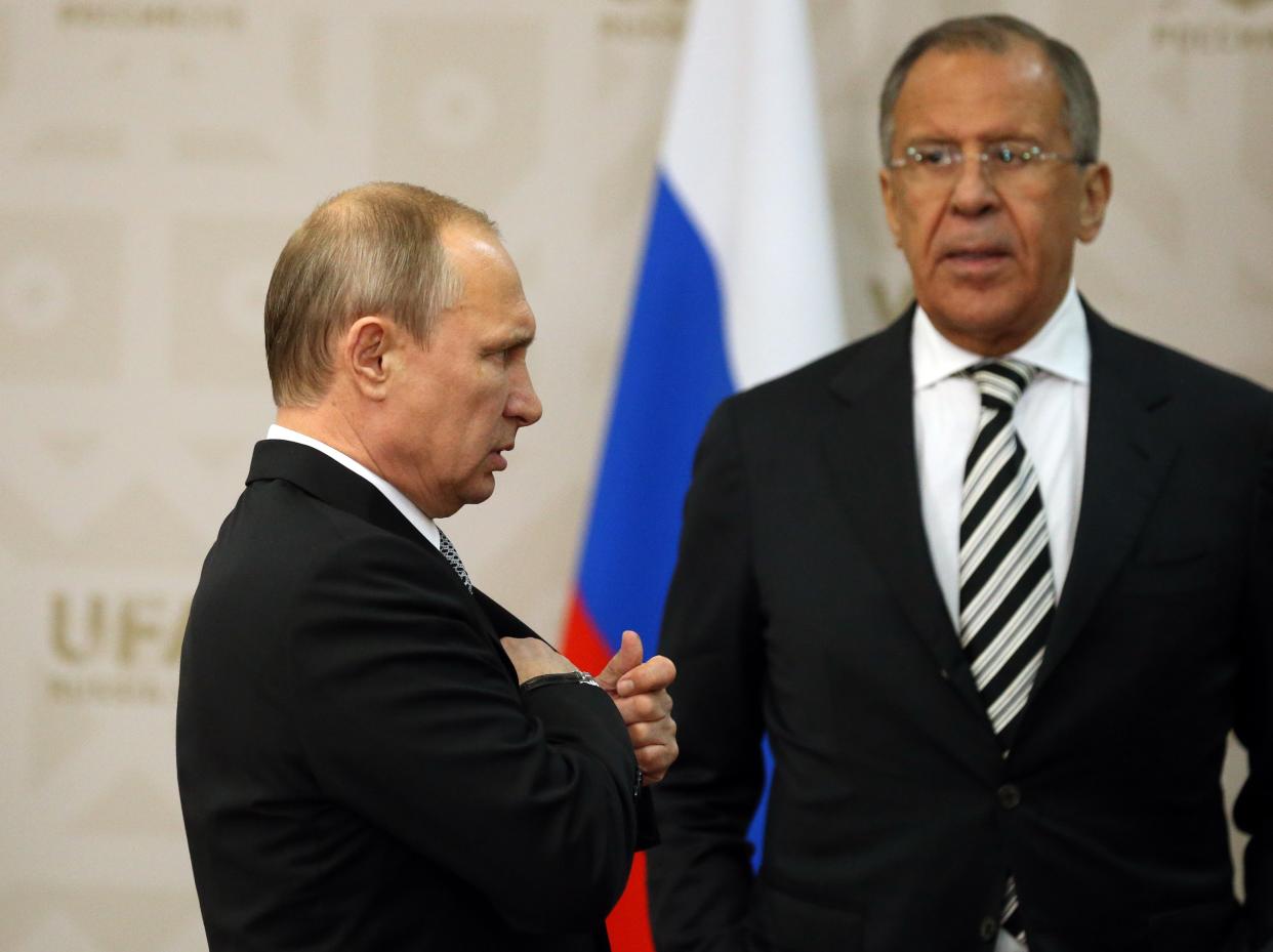 Russian minister Sergei Lavrov with Vladimir Putin (Getty Images)