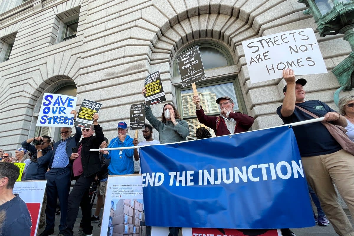 Residents and business leaders opposed to a federal judge's December order halting encampment sweeps rally before an appellate court hearing in San Francisco, Wednesday, Aug. 23, 2023 (Copyright 2023 The Associated Press. All rights reserved)