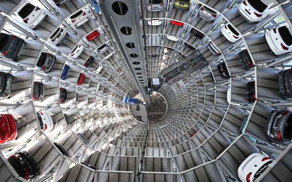 Volkswagens inside one of the twin towers used as storage at the Autostadt visitor attraction next to the Volkswagen factory in Wolfsburg, Germany