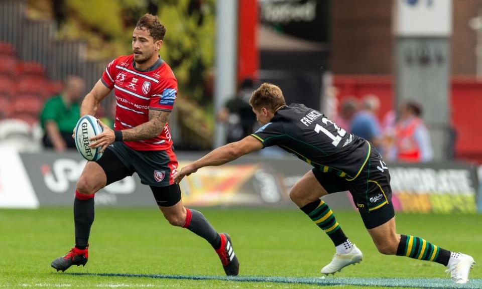 Danny Cipriani eludes the Northampton centre Piers Francis at Kingsholm.