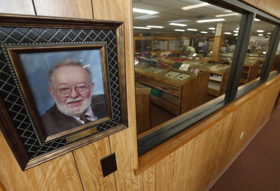 A portrait of Allen Karn, founder of Allen's, hangs on the wall at the store.