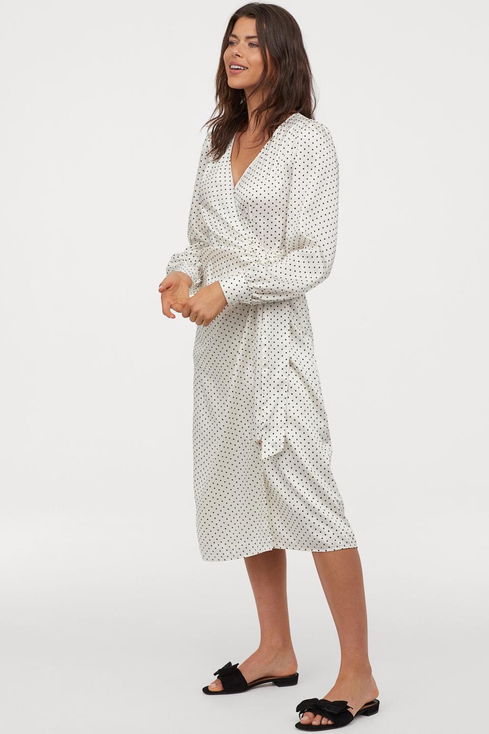 <b>Buy It!</b> H&M Calf Length Wrap Dress, $60; <a href="https://click.linksynergy.com/deeplink?id=93xLBvPhAeE&mid=43148&murl=https%3A%2F%2Fwww2.hm.com%2Fen_us%2Fproductpage.0759116003.html&u1=PEO%2CShopping%3A15GorgeousWrapDressestoShopThisSummer%2CInspiredbyMeghanMarkleandMoreCelebs%2Crcarhart31%2CUnc%2CGal%2C7085788%2C201905%2CI" rel="nofollow noopener" target="_blank" data-ylk="slk:hm.com;elm:context_link;itc:0;sec:content-canvas" class="link ">hm.com</a>