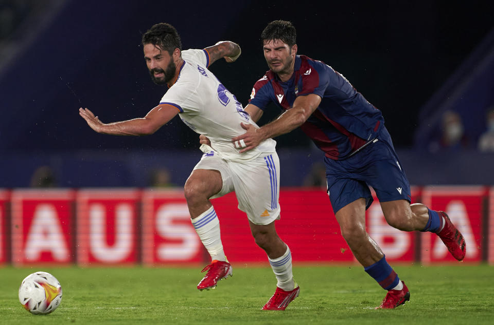 VALENCIA, SPAIN - AUGUST 22: Gonzalo Melero of Levante UD competes for the ball with Isco Alarcon of Real Madrid during the La Liga Santander match between Levante UD and Real Madrid CF at Ciutat de Valencia Stadium on August 22, 2021 in Valencia, Spain. (Photo by Quality Sport Images/Getty Images)