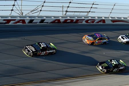 Oct 14, 2018; Talladega, AL, USA; NASCAR Cup Series driver Aric Almirola (10) takes the lead from NASCAR Cup Series driver Kurt Busch (41) during the 1000Bulbs.com at Talladega Superspeedway. Mandatory Credit: Adam Hagy-USA TODAY Sports