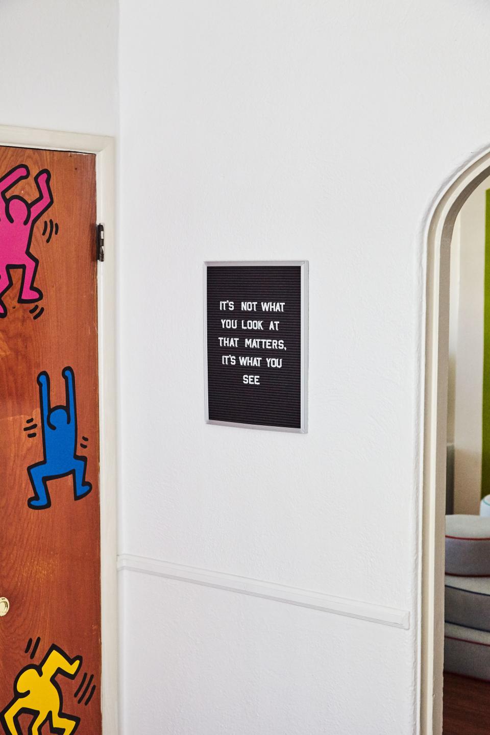 Last but not least, a little Keith Haring on the door and a little Henry David Thoreau on the wall.