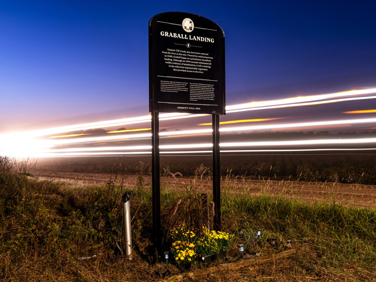 A tractor passes an Emmett Till commemorative marker in Tallahatchie County, Mississippi, that was rededicated Oct. 19 at a ceremony hosted by the Emmett Till Memorial Commission. The new sign is bulletproof. (Photo: Johnathon Kelso for HuffPost)