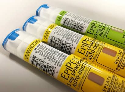 FILE PHOTO: EpiPen auto-injection epinephrine pens manufactured by Mylan NV pharmaceutical company for use by severe allergy sufferers are seen in Washington, U.S. August 24, 2016.  REUTERS/Jim Bourg/File Photo