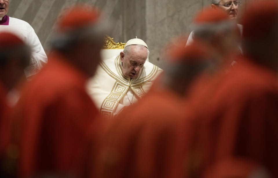 Pope Francis presides over the first Vespers and the 'Te Deum' in St. Peter's Basilica Saturday, Dec. 31, 2022. Pope Emeritus Benedict XVI, the German theologian who will be remembered as the first pope in 600 years to resign, has died, the Vatican announced Saturday. He was 95. (AP Photo/Andrew Medichini)