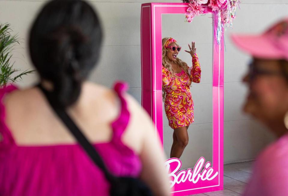 Stacey Sequeira poses for a photo dressed as ‘60s Barbie at Cinépolis Coconut Grove in Miami, Fla., on Sunday, July 23, 2023.