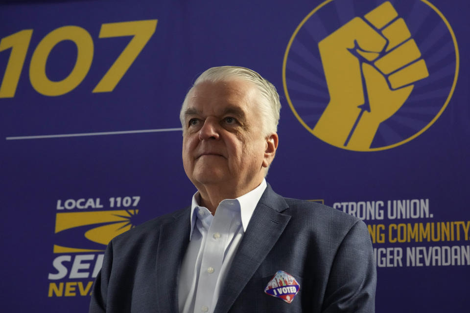 Nevada Gov. Steve Sisolak listens during a campaign event Tuesday, Nov. 8, 2022, in Las Vegas. (AP Photo/John Locher)