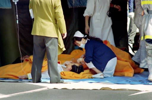 The attack during the capital's notoriously crowded rush hour paralysed the Japanese capital, turning it into a virtual warzone as injured people staggered out of the underground struggling for breath and with watering eyes