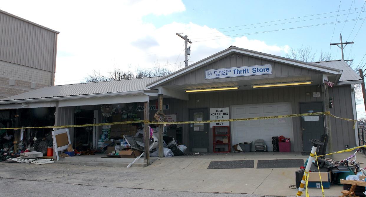 The St. Vincent De Paul Society thrift store in Bedford stands empty Thursday afternoon. A fire gutted the store Tuesday evening.
