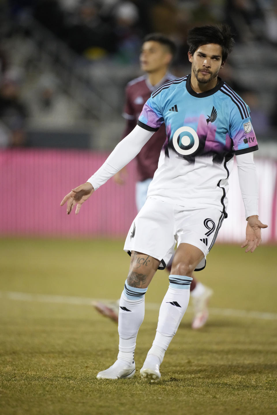 Minnesota United forward Luis Amarilla reacts after scoring a goal on a penalty kick against the Colorado Rapids during the second half of an MLS soccer match Saturday, March 18, 2023, in Commerce City, Colo. (AP Photo/David Zalubowski)