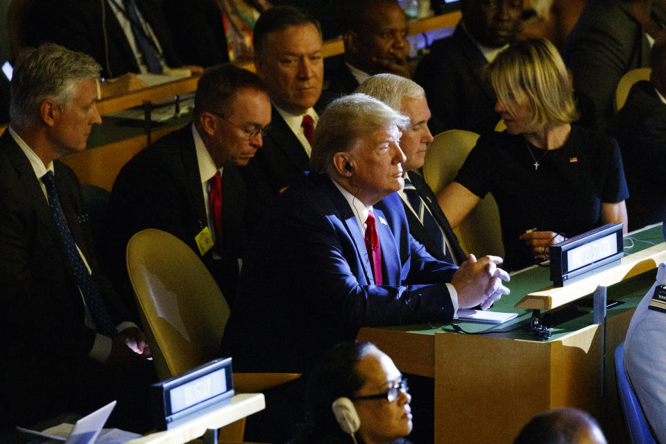 President Donald Trump listens during the the United Nations Climate Action Summit during the General Assembly, Monday, Sept. 23, 2019, in New York. From left, National Security Adviser Robert C. O'Brien, White House chief of staff Mick Mulvaney, Secretary of State Mike Pompeo, Trump, Vice President Mike Pence, and U.S. Ambassador to the United Nations Kelly Craft. (AP Photo/Evan Vucci)