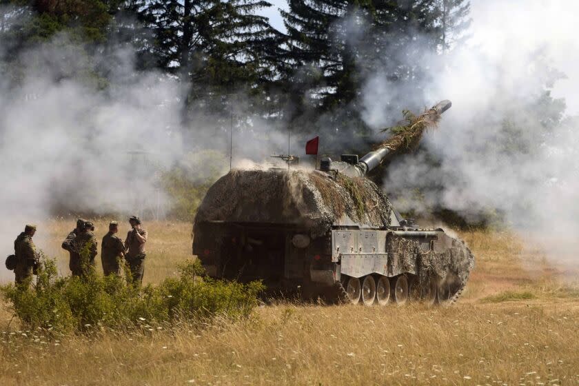 Soldiers fire an armoured howitzer Panzerhaubitze 2000 during an exercise of the U.S. Army in Grafenwoehr, Germany, Wednesday, July 20, 2022. Dynamic Front 22, led by the 56th Artillery Command and directed by U.S. Army Europe and Africa, is the premier U.S. led NATO and partner integrated fires exercise in the European Theater focused on fires interoperability designed to increase readiness, lethality and interoperability across the human, procedural, and technical domains. (AP Photo/Michael Probst)