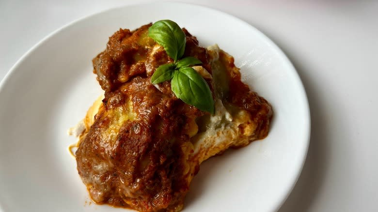 a plate with ravioli lasagna portion