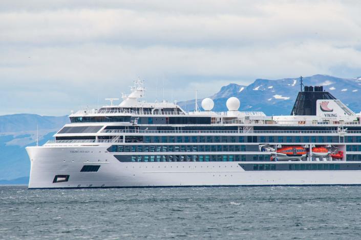 Viking Polaris ship of norwegian flag, is seen anchored in waters of the Atlantic Ocean in Ushuaia, southern Argentina, on December 1, 2022. One person was killed, and four other passengers were injured when a giant wave broke several panes of glass on a cruise ship sailing in Antarctic waters in a storm on November 29, Norwegian company and Argentine judicial sources said on December 1.