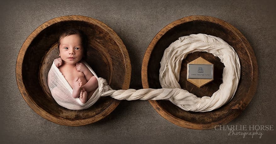 A photo of newborn baby Tiger lying next to the ashes of his late brother, Johnny, with the pair connected by a symbolic umbilical cord of white muslin cloth. (Photo: Courtesy of Sarah Simmons)