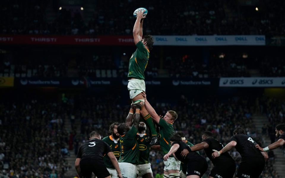  South Africa's Eben Etzebeth, top, catches the ball during the line out for the Rugby Championship test between South Africa and New Zealand at Mbombela Stadium in Mbombela, South Africa - AP Photo/Themba Hadebe