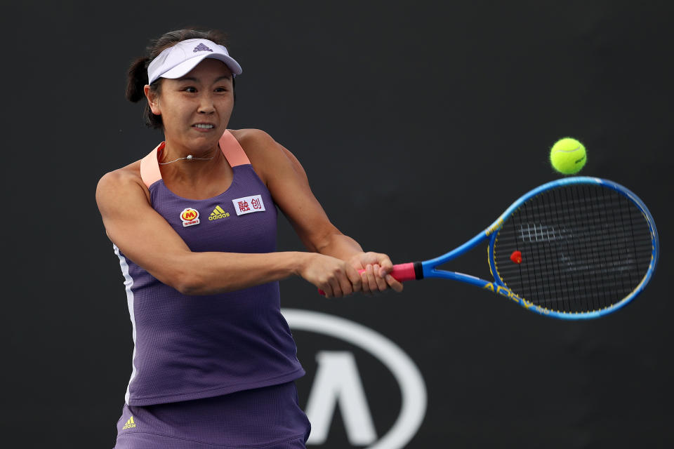 MELBOURNE, AUSTRALIA - JANUARY 23: Shuai Peng of China plays a backhand during her Women's Doubles first round match with partner Shuai Zhang of China against Veronika Kudermetova of Russia and Alison Riske of the United States on day four of the 2020 Australian Open at Melbourne Park on January 23, 2020 in Melbourne, Australia. (Photo by Clive Brunskill/Getty Images)