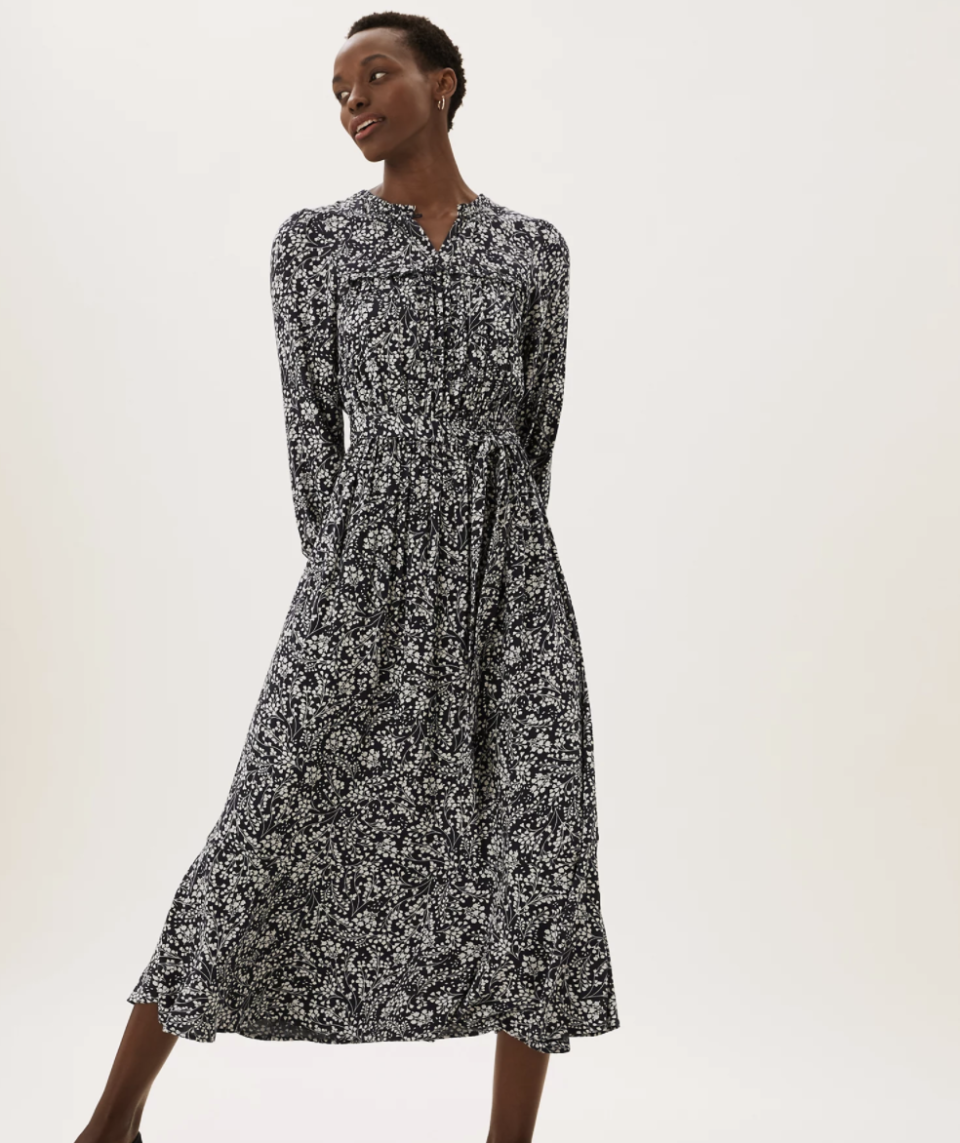 The floral dress can be worn by itself or layered with knitwear. (Marks & Spencer)