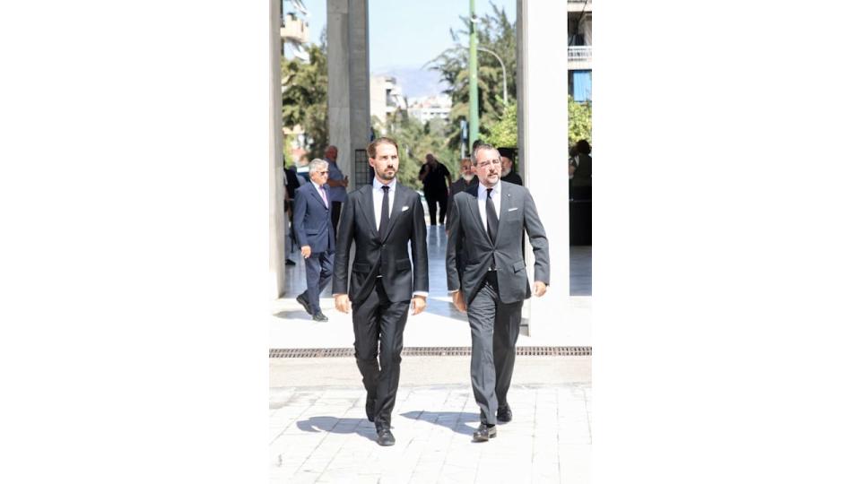 Prince Philippos and Prince Nikolaos in suits