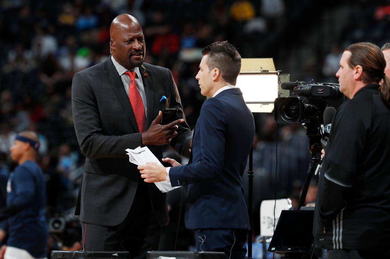 Oklahoma City Thunder television color analyst Michael Cage in the first half of an NBA basketball game Tuesday, Feb. 26, 2019, in Denver.