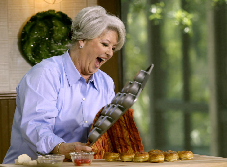 FILE - This 2006 file photo originally released by the Food Network shows celebrity chef Paula Dean. Paula Deen’s fans are serving up deep-fried outrage to the Food Network for its decision to dump the Southern comfort food queen after she acknowledged using racial slurs in the past. (AP Photo/ Food Network, file)