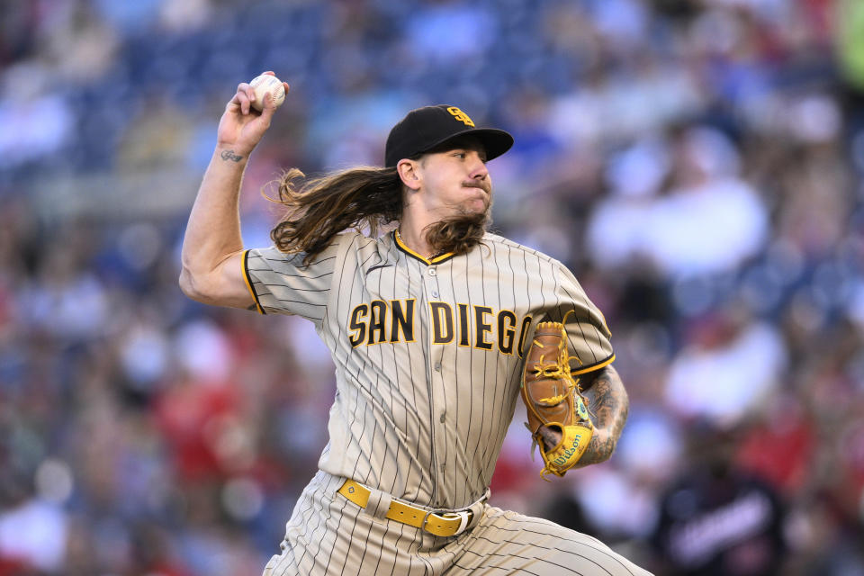 San Diego Padres starting pitcher Mike Clevinger throws during the first inning of the team's baseball game against the Washington Nationals, Friday, Aug. 12, 2022, in Washington. (AP Photo/Nick Wass)