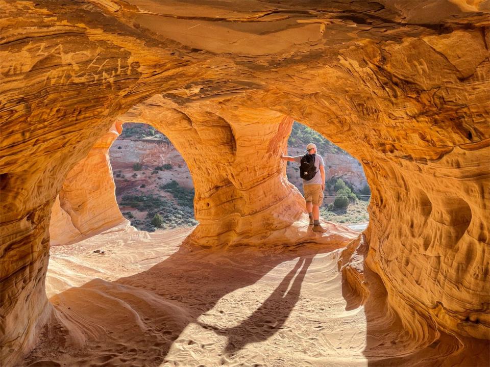 timothy moore standing at Kanab Sand Caves