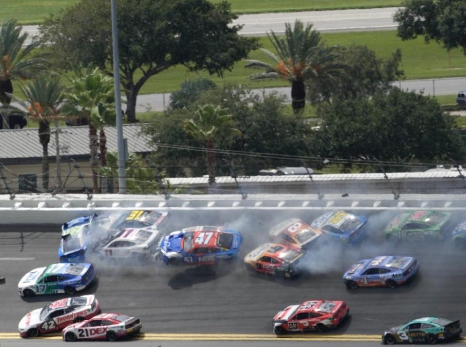 Austin Dillon's No. 3 Chevy (bottom right) skated through this final crash and was leading when the rain stopped the racing soon thereafter.