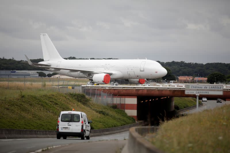 FILE PHOTO: An unmarked A320-214SL Airbus plane is seen on the tarmac at the Airbus factory in Blagnac