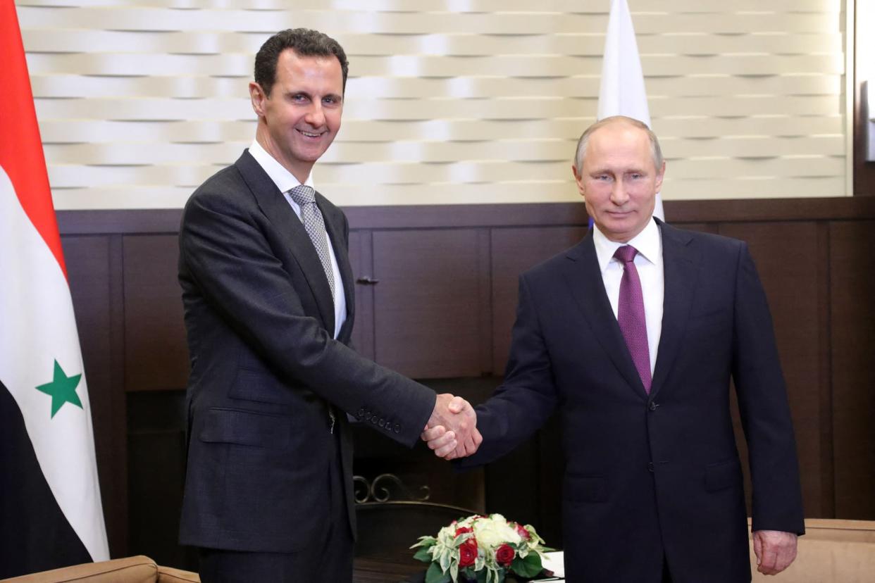 Bachar al-Assad et Vladimir Poutine, lors d'une rencontre à Sotchi le 20 novembre 2017 - Mikhail Klimentyev - Sputnik - AFP