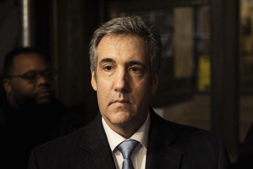 Michael Cohen talks to reporters as he leaves the District Attorney's office after testifying before a grand jury in New York, Monday, March 13, 2023. (AP Photo/Yuki Iwamura)