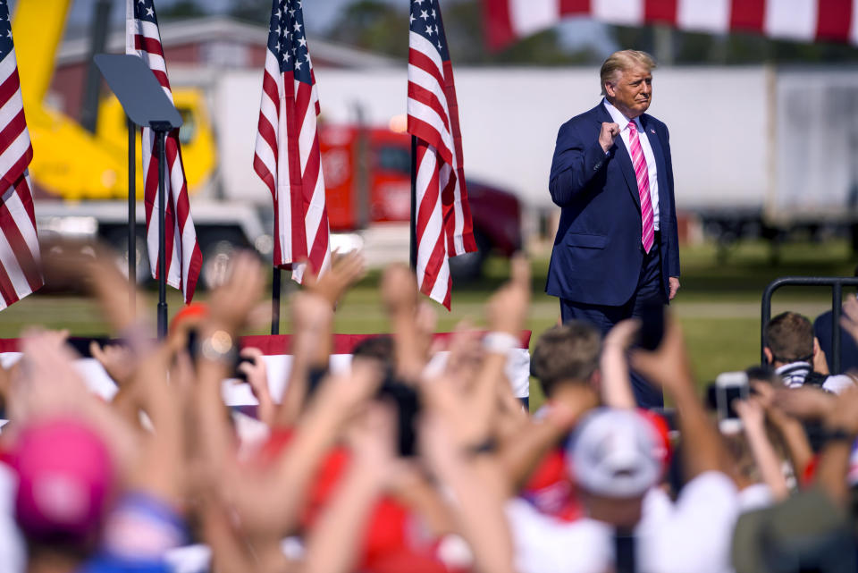 LUMBERTON, NC - OCTOBER 24:  U.S. President Donald Trump addresses a crowd during a campaign rally on October 24, 2020 in Lumberton, North Carolina. President Trump has expressed his support for the Lumbee Indian people to be recognized on a federal level. President Trump continues to campaign against Democratic presidential nominee Joe Biden leading up to the November 3rd Election Day. (Photo by Melissa Sue Gerrits/Getty Images)