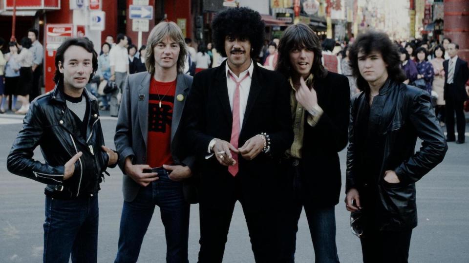 Snowy White with Thin Lizzy posing in China Town, Yokohama, 1980.