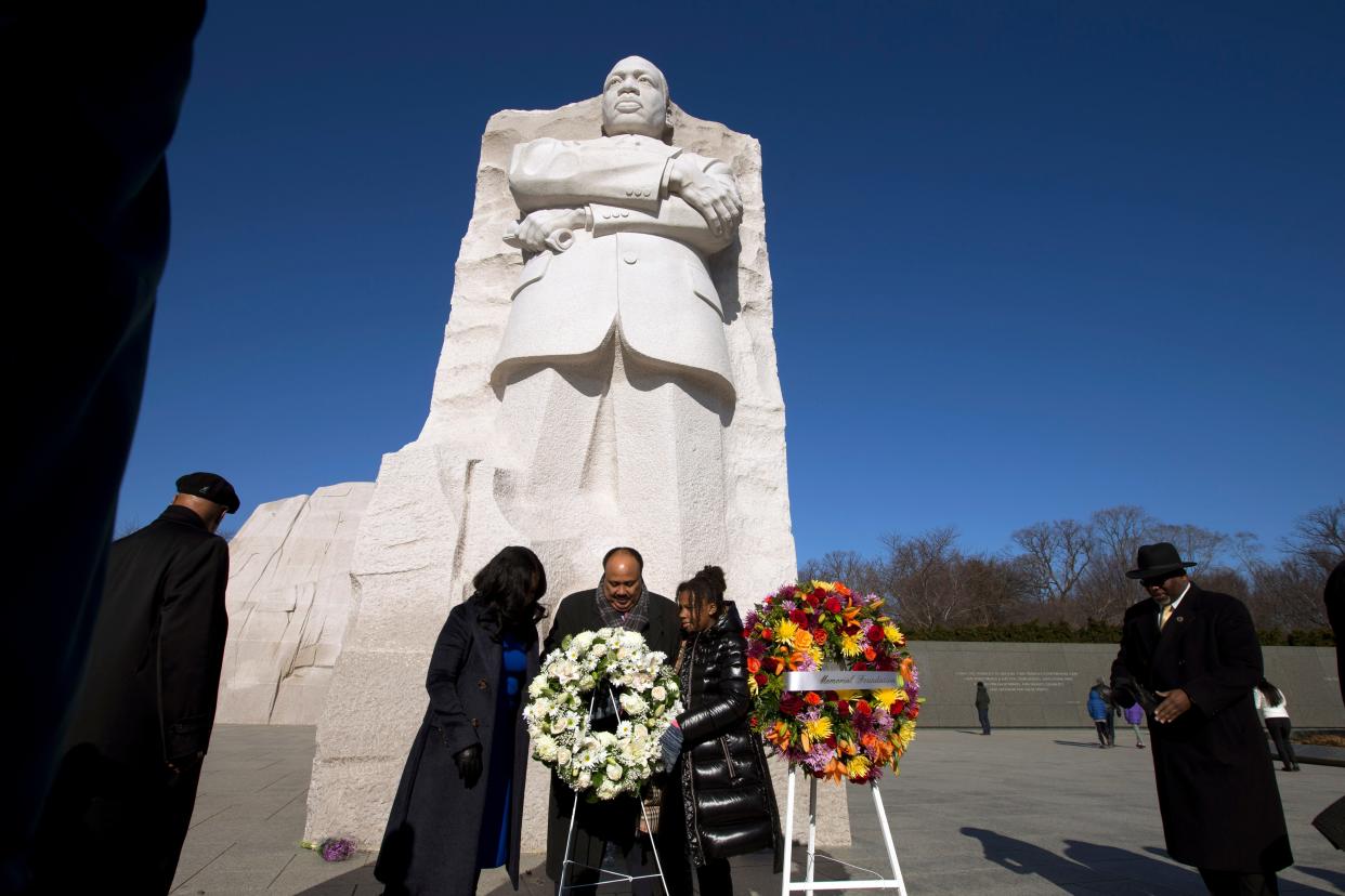 Martin Luther King III accompanied by his wife Andrea Waters King and his daughter Yolanda places a wreath at the base of Martin Luther King, Jr. Memorial during the 9th Annual Wreath Laying and Day of Reflection and Reconciliation, in Washington, Jan. 20, 2020.