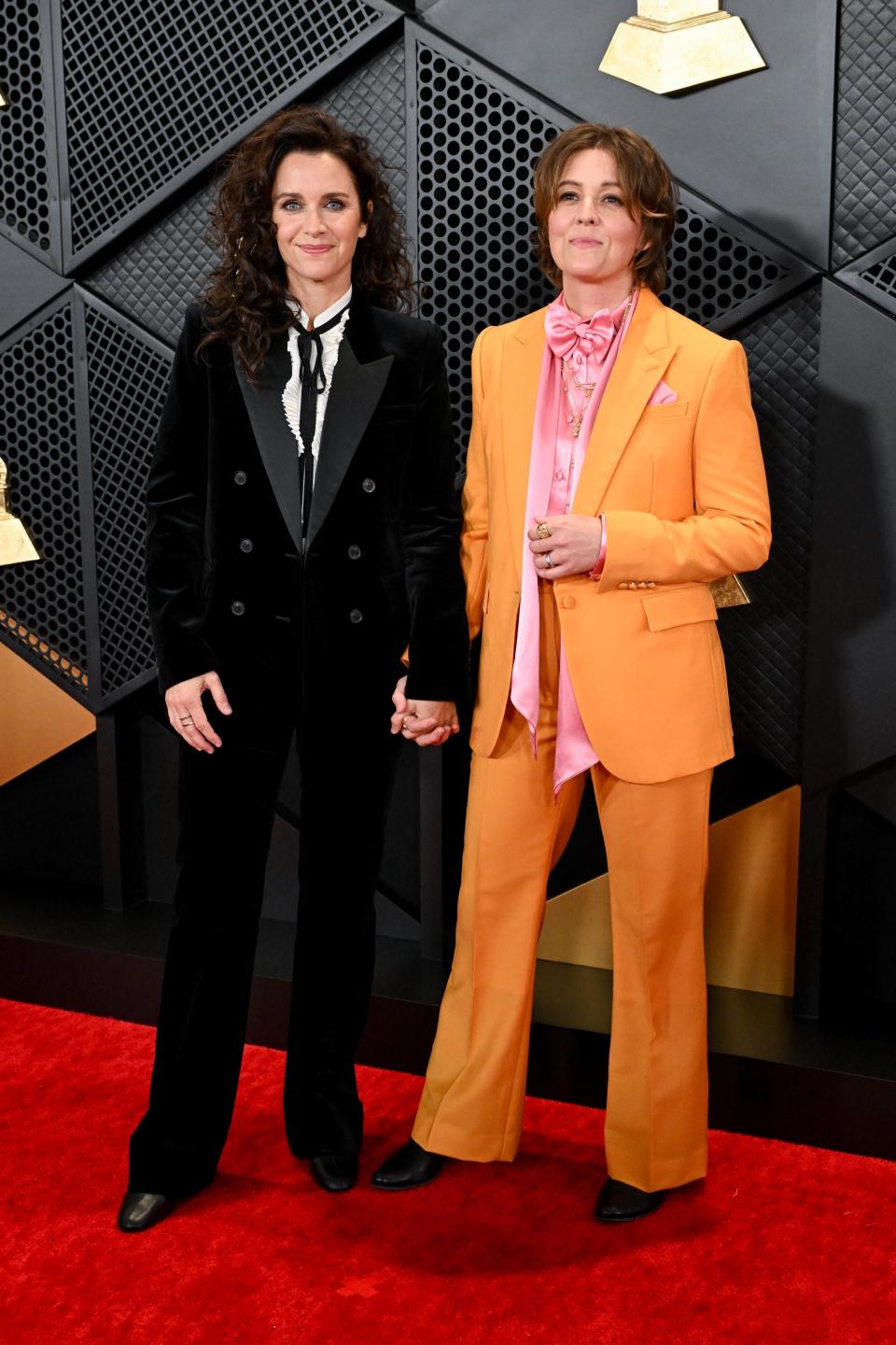 Catherine Shepherd and Brandi Carlile attend the 2024 Grammys.