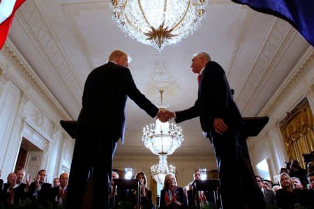 Australia's Prime Minister Malcolm Turnbull and U.S. President Donald Trump shake hands during a news conference at the White House in Washington, U.S. February 23, 2018.  REUTERS/Jonathan Ernst