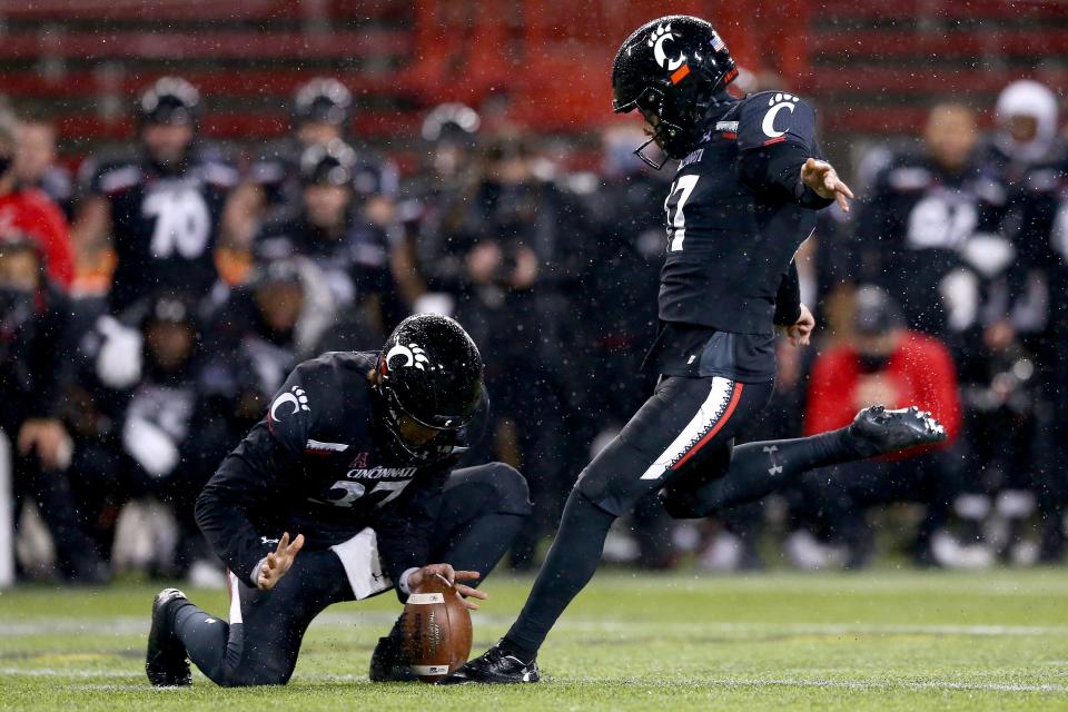 Cincinnati Bearcats place kicker Cole Smith (17) kicks the game-winning field goal during the American Athletic Conference championship football game against Tulsa Dec. 19, 2020.